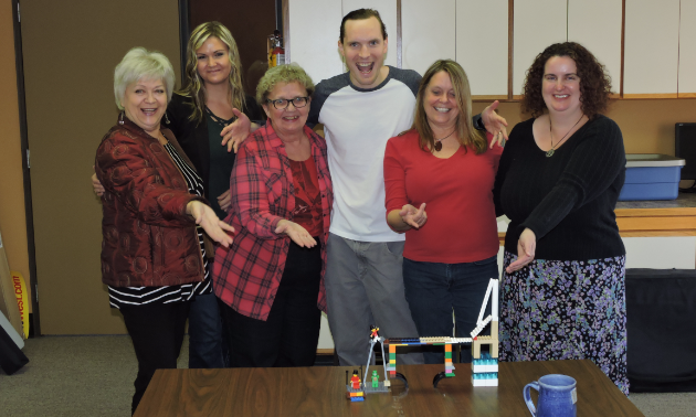 (L to R) Marie Milner, Kirsten Armleder, Sandra Albers, Kyle Born, Virginia Rasch and Julie Matchett celebrate a day of teambuilding with Life Roots Consulting’s Lego Serious Play.