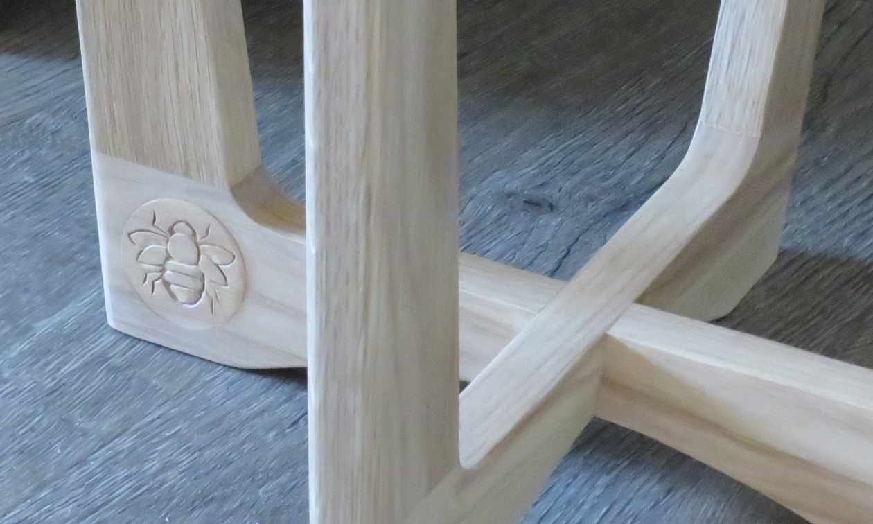 Besides the curvaceous aesthetic, Mike’s carpentry also features a buzz-worthy insignia. 