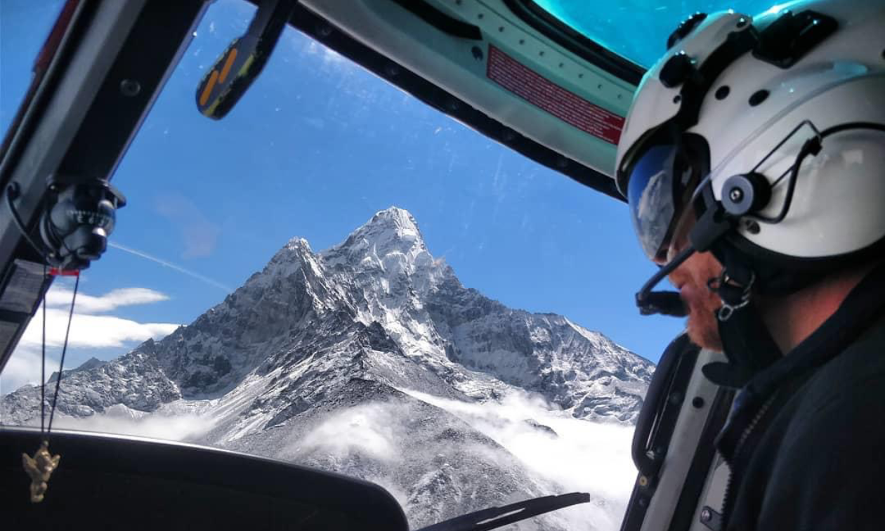 Eric Ridington looks out his glider canopy window to see a huge snow-covered mountain in front of him.