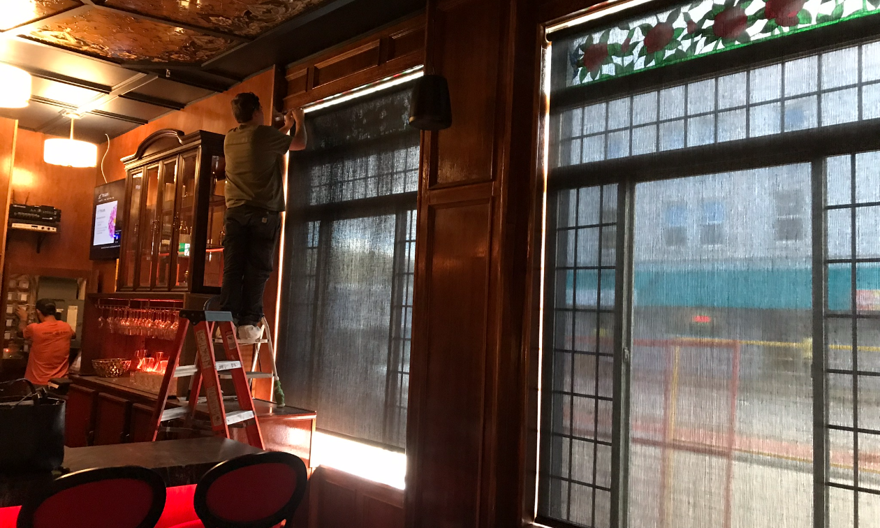 SMART shades are being installed in a restaurant. 