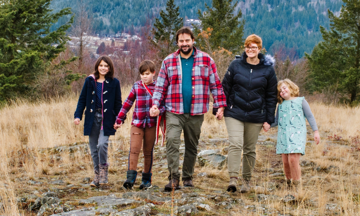 (L to R) Almé, Troy, Floris, René and Pippa Steenkamp walk through a glade in the forest.