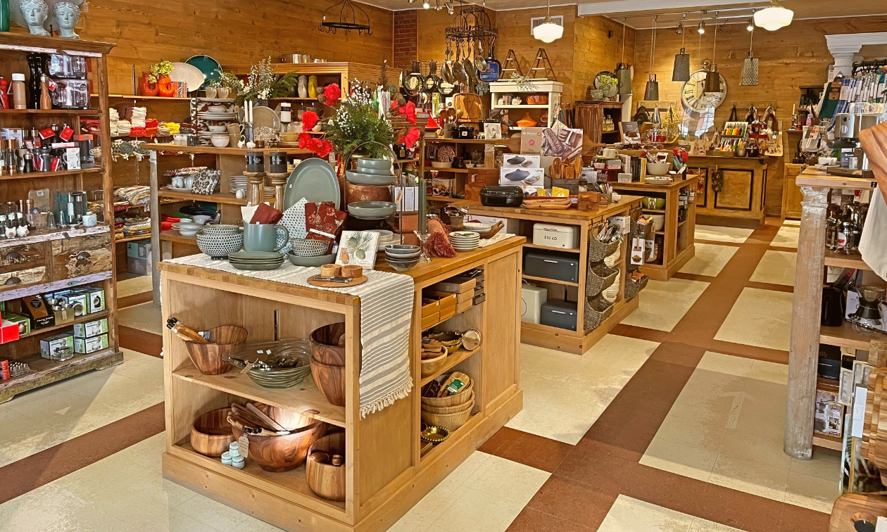 The interior of The Grater Good has shelves of cookware, bakeware and tableware.