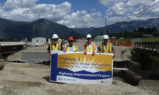 Site photo of Little Sand Creek Bridge - left to right: Andrew Madell, Site supervisor for the general contractor, Copcan Contracting; Bill Bennett, Minister of Energy and Mines; Todd Stone, Minister of Transportation and Infrastructure; Brent Shypitka, Ministry Representative.