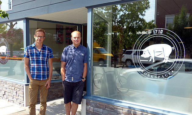 Lee Tengum and Nathan Troxel standing in front of 1710 Workspace in Cranbrook. 