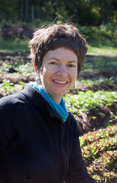 Paris Marshall Smith smiling with a garden off in the background. 