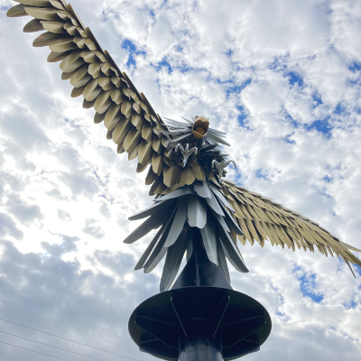 A large eagle made of steel framework.