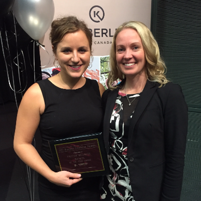 Kimberley Chamber of Commerce president, Rachelle Langlois, presents Allissa Keane (left) of Fruition Wellness with Business of the Year honours
