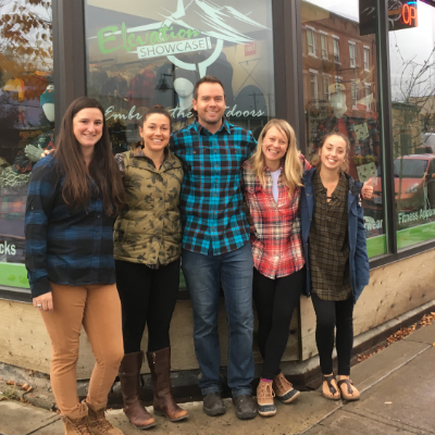 A group of people stand in front of Elevation Industries. (L to R) Christine Walsh, Christy Sutherland, Lance Edwards, Lucia Glasse-Davies, Sydney Salvador. 