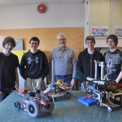The Mount Baker Secondary School robotics program consists of (L to R) Dominic Lucas, Cesar Garcia Moreno, instructor Bill Walker, Thomas Keene and Ryley Holliday.