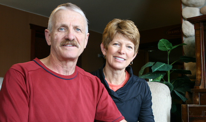 A photograph of a seated couple.