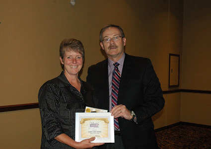Sydney-Anne Porter of AG Valley Foods in Invermere was recognized with a 2012 Kootenay Women in Business award presented by Keith Powell.