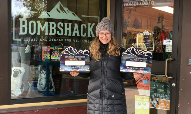 Alicia Gray is proud to show off her 2018 Trail Chamber of Commerce awards for Emerging Entrepreneur and Business of the Year. 