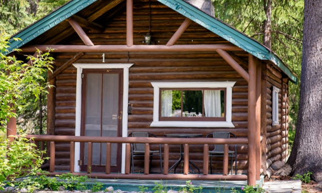 An old log cabin in the woods.