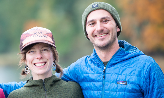 Melissa Welsh and Mike Irvine smile next to each other. 