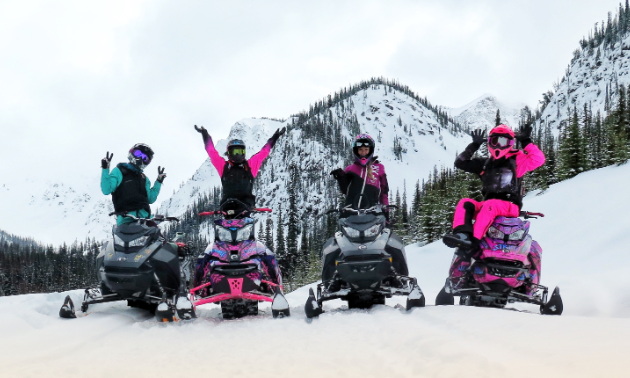 Brittney Dickson (on left) takes some women out for a ride during one of Stay Wild Backcountry Skills’ Ladies Sled Shred Camps. 