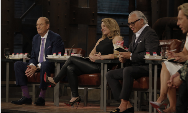 Jim Treliving (left) made a deal with Brenda Palmer on CBC’s Dragon’s Den. 
