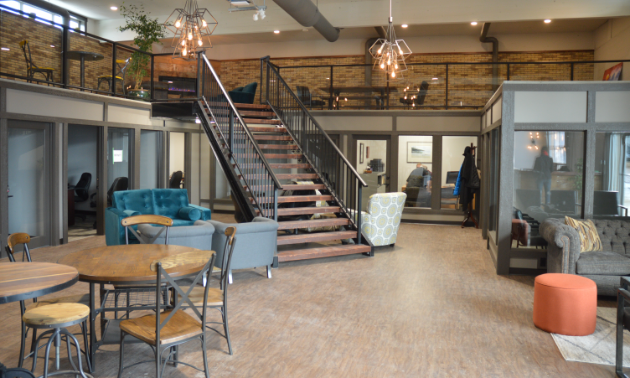 The Ground Floor Co-working Space interior is shown with a large staircase. 