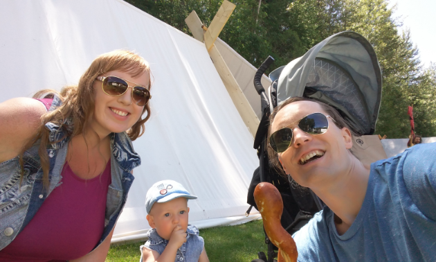 (L to R) Becky, Augustus and Kyle Born enjoy snake-on-a-stick from the Kimberley City Bakery. Nom nom nom! 