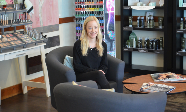 Lindsay Reynolds smiles in her store, Three Sisters Day Spa.