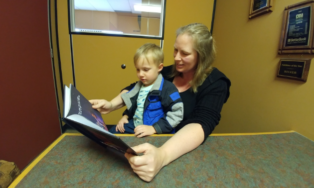 Michelle Forbes, author of Viking Lullaby, reads her book to her son, Jack.