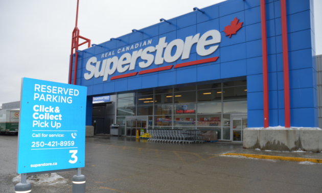 Superstore in Cranbrook is pictured with a sign in the forefront for Click and Collect parking