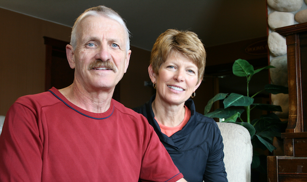 A photograph of a smiling couple.