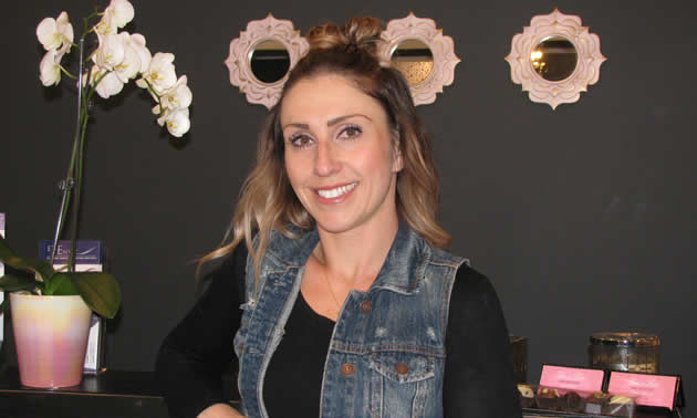 Amy Walker in the black, white and silver decor of Lux & Lace, her new hair salon.