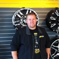 Photo Jay Pratt, new co-owner OK Tire in Cranbrook