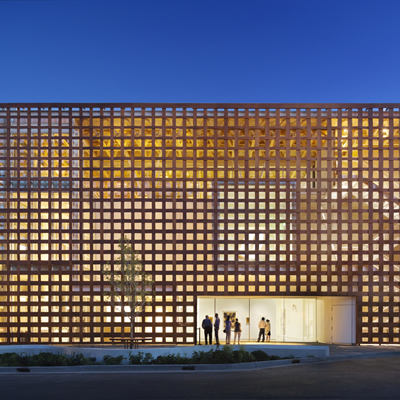 The Aspen Art Museum in Aspen, Colorado, has latice-like, woven wood cladding that admits light from all directions.