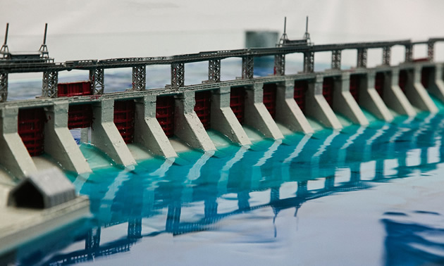 A 3D printed structure model of a dam - the model is set up on a shake table to represent how dams respond during an earthquake.