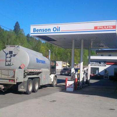 Castlegar's Downtown Shell - Benson Oil, showing fuel truck at station. 