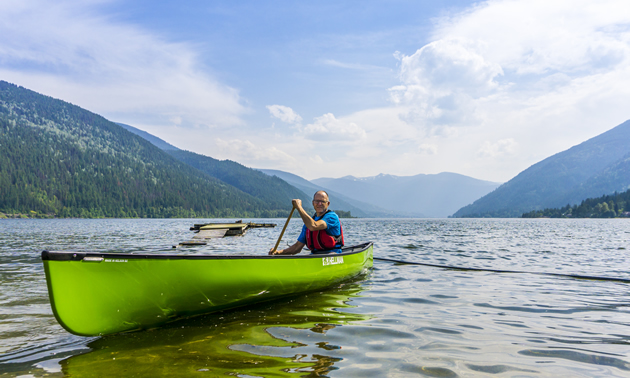 Bob Hellman, paddling on Kootenay Lake in one of his own canoes