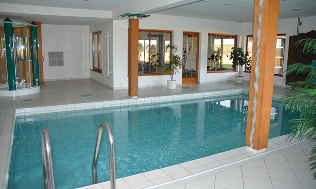 Spa area features a swimming pool, exercise room and free-standing shower enclosure
