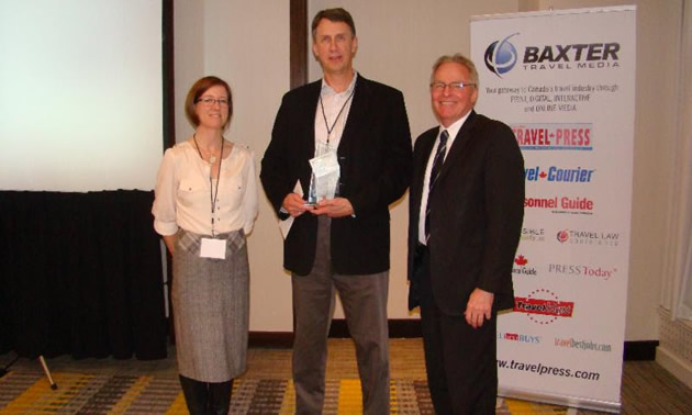 CMH Director of Sustainability Dave Butler (center) with Penny Thompson, Manager of Environmental Sustainability for Air Canada (left), and David McClung, President of Baxter Travel Media (right)