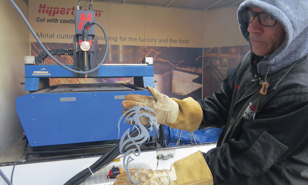 Vince Tucker from Hypertherm demonstrates the design capabilities of a plasma cutter.