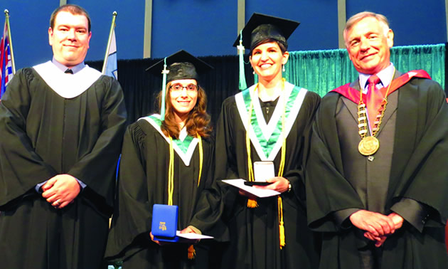 College of the Rockies Board of Governors member Jesse Nicholas (l) along with College President David Walls (r) presented academic medals to Shelley Bergeron (2nd from left) and Darcie Musil (2nd from right).