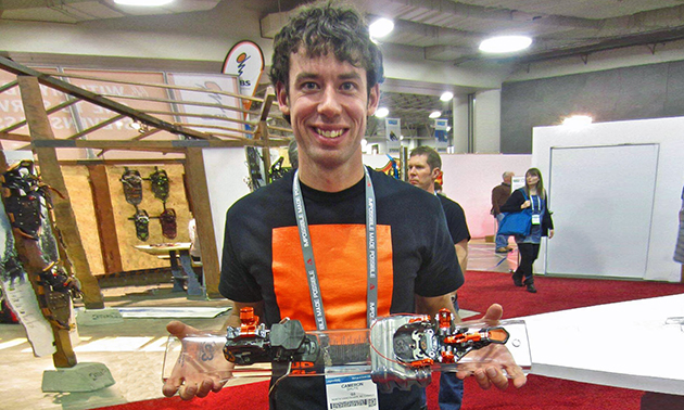 Cam Shute holding ski bindings. 