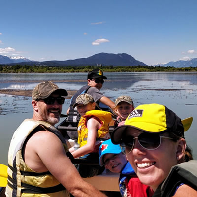 A family participating in one of Columbia River Paddle's adventures.
