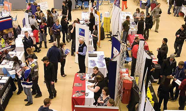Job seekers visit and gather information from the dozens of booths at the annual Career & Job Fair at College of the Rockies
