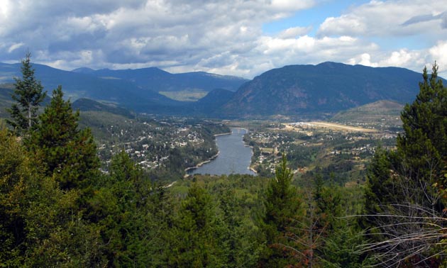 An aerial view of Castlegar shows the West Kootenay Regional Airport and the surrounding lands. 