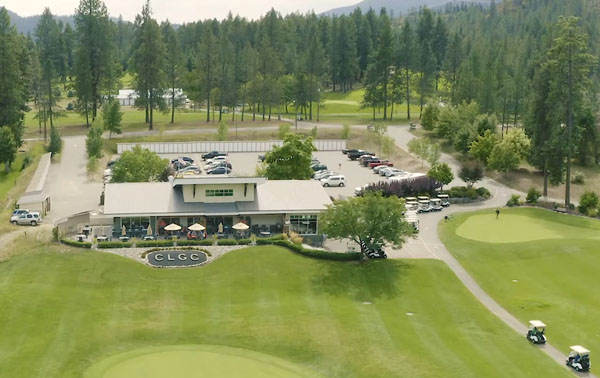 Aerial view of the Christina Lake Golf Club, showing greens and clubhouse. 