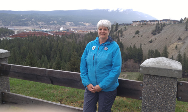 Clara Reinhardt, mayor of Radium Hot Springs, with the beautiful Columbia Valley behind her