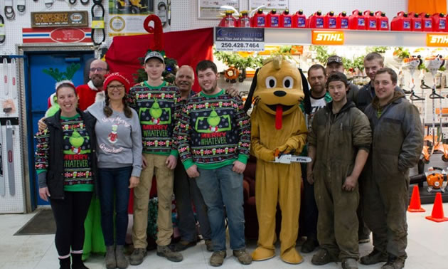 Staff of Comfort Welding in group photo taken at Christmas time. 