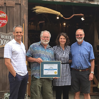 Longtime Community Futures volunteer Rob Schwieger with Community Futures Self-Employment Program Manager, Wade Sather, Executive Director, Andrea Wilkey, and Board Director, Bob Wright.