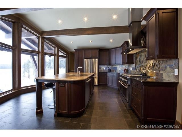 Looking out floor to ceiling windows from the Kitchen of the Cranbrook home for sale.