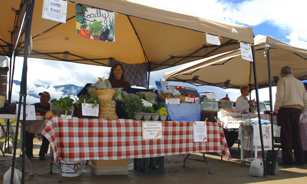 A booth at the Creston Valley Farmers' Market has local produce.