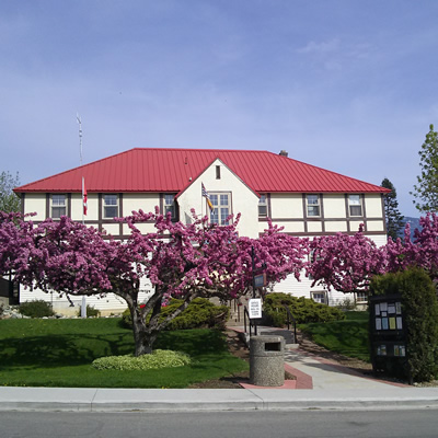 Flowering trees enhance the curb appeal of Creston Town Hall.