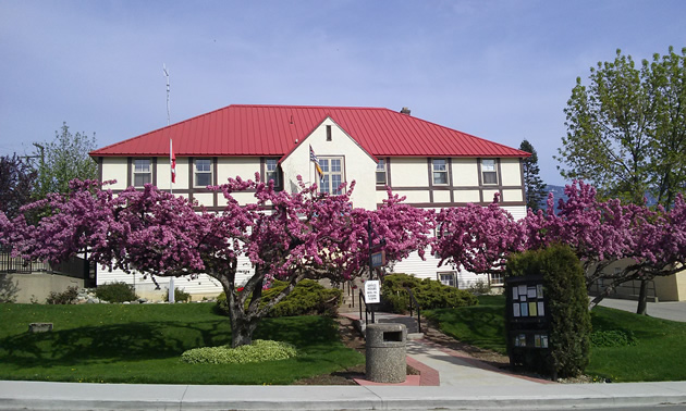 Flowering trees enhance the curb appeal of Creston Town Hall.