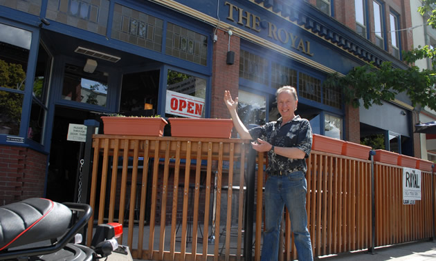 Dale Arsenault standing in front of The Royal restaurant in Nelson, BC