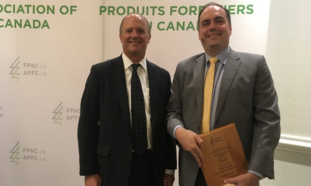 David Gandossi (left), president and CEO of Mercer International Inc., and Brian Merwin , vice-president of corporate development at Mercer International Inc.at the Forest Products Association of Canada awards ceremony (May 9, 2019, Vancouver, B.C.)